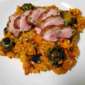 Paella with Seared Duck Breast, Sweet Potato and Brussels Sprouts