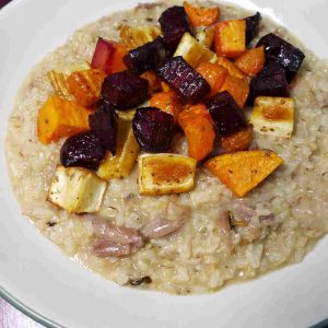 Duck Confit Risotto Topped with Roasted Root Vegetables