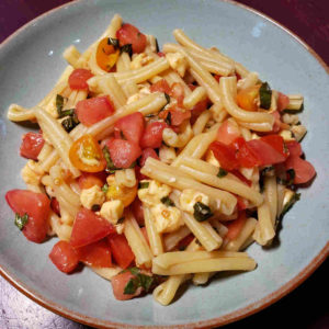 No Cook Sauced Pasta - Tomatoes, Garlic, Basil, Mozzarella, Salt, Pepper and Olive Oil Marinated Together Before Adding Hot Pasta