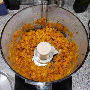 Pulse for 30 to 40 seconds to finely chop the roasted carrots.
