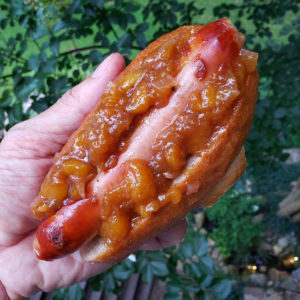 Peach chutney livens up a simple hot dog.