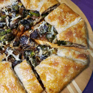 Savory Galette with Brussels Sprouts, Caramelized Onions and Hickory Grove Cheese.
