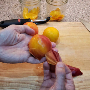 peach in the process of being peeled