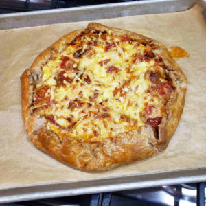 This is what it looks like when it comes out of the oven. Let it sit for 10 minutes before trying to cut and serve.