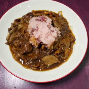 Carbonnade, a Flemish stew, served with mashed terra rosa potatoes.
