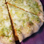 Pizza - simply garlic scape pesto and cheese!