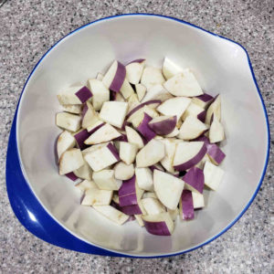 Clean and chop a generous pound of eggplant.