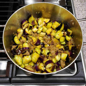 Add a pound of chopped eggplant that has been through a quick toss with olive oil and brine.