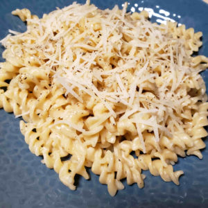 Cacio e Pepe garnished with a little more cheese and black pepper