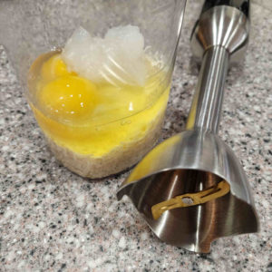 Put the cornstarch gel, a couple large eggs and the grated cheese into a jar.
