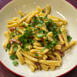 Plate and garnish with chopped parsley.