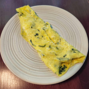 But I like the convenience of stirring the leeks into the beaten eggs. The omelet tastes just as good!